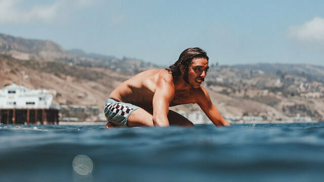 Andy Nieblas surfing